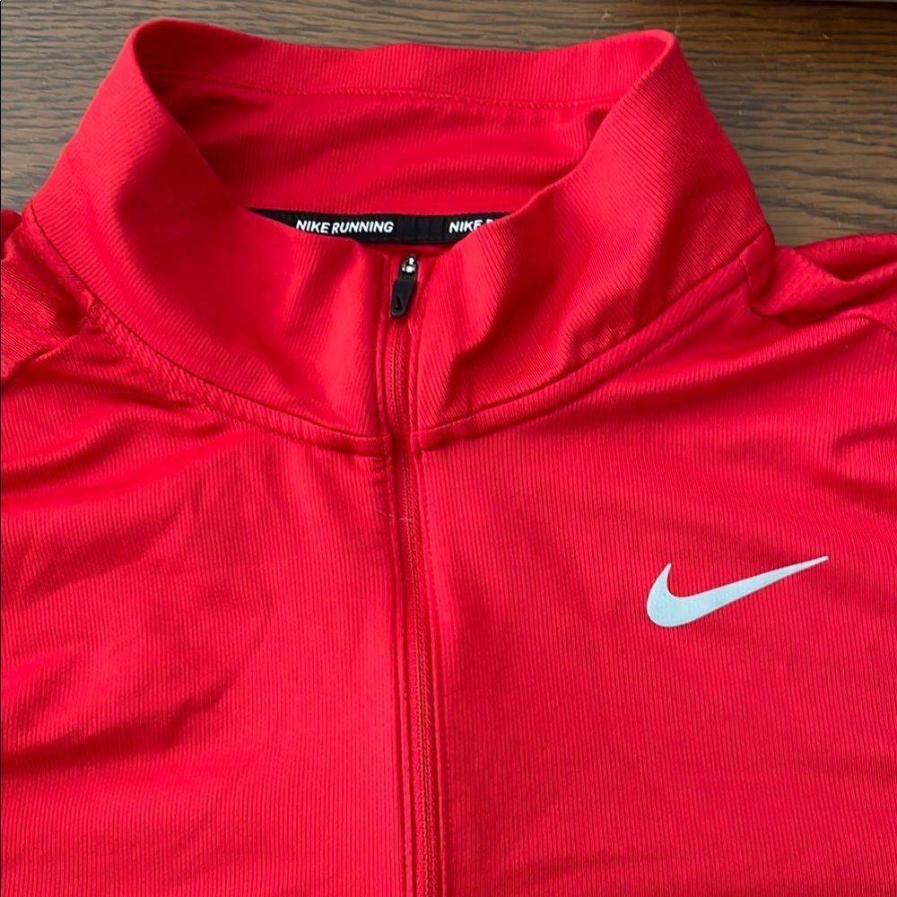 Nike Red Sports Jacket with Silver Logo